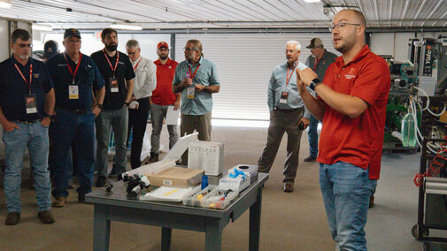 Milos Zaric gives tour to visitors in the PAT Lab